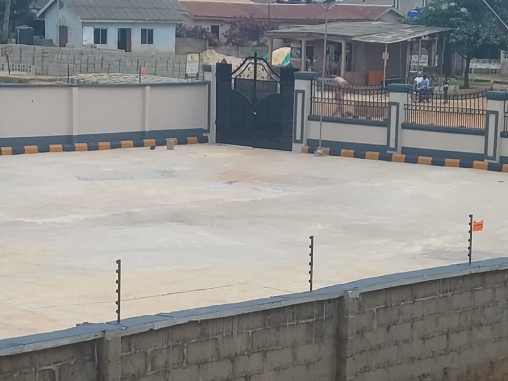 Overview of the paved event ground and perimeter wall